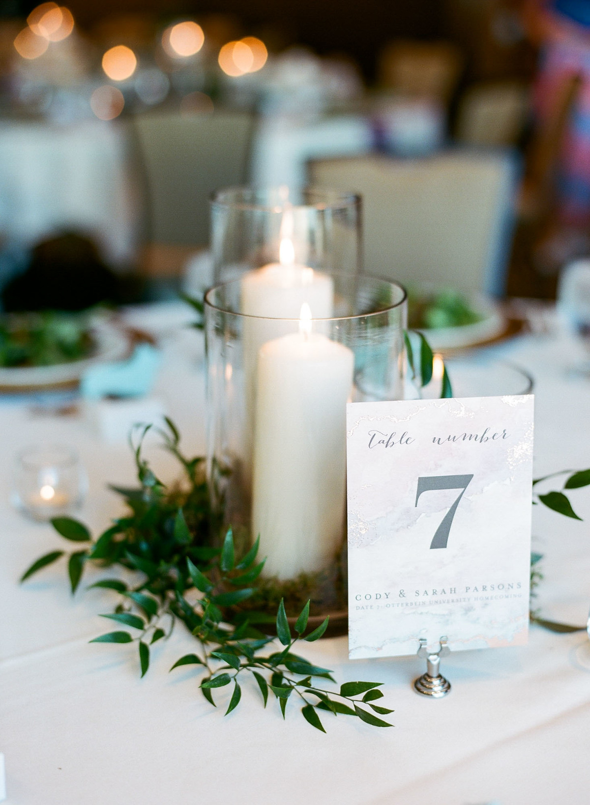 Candles and greenery centerpieces
